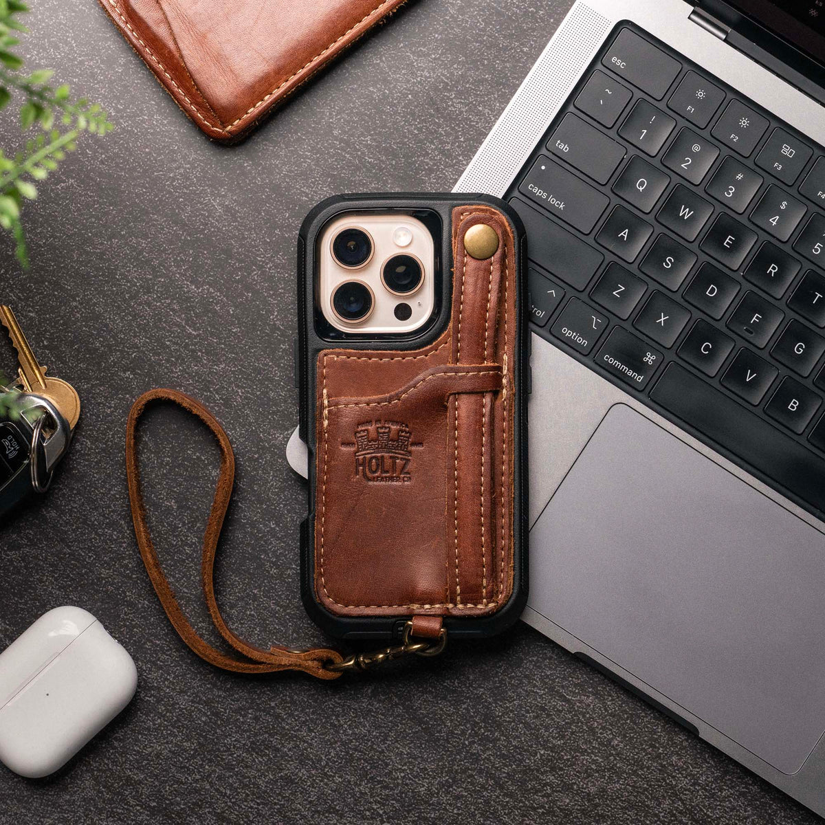 The SWITCH 4-IN-1 Leather Phone Case - WALLET, KICKSTAND &amp; LOOP for iPhone®