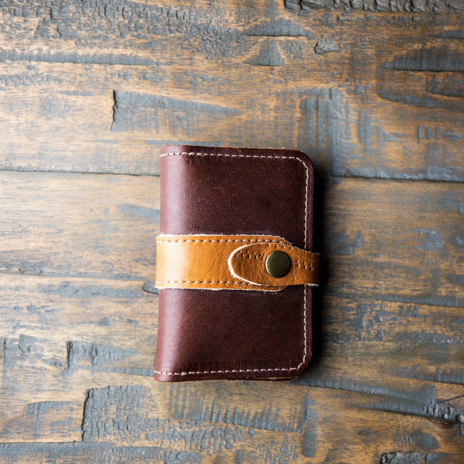 Front pocket wallet with snap closure made of vintage baseball glove