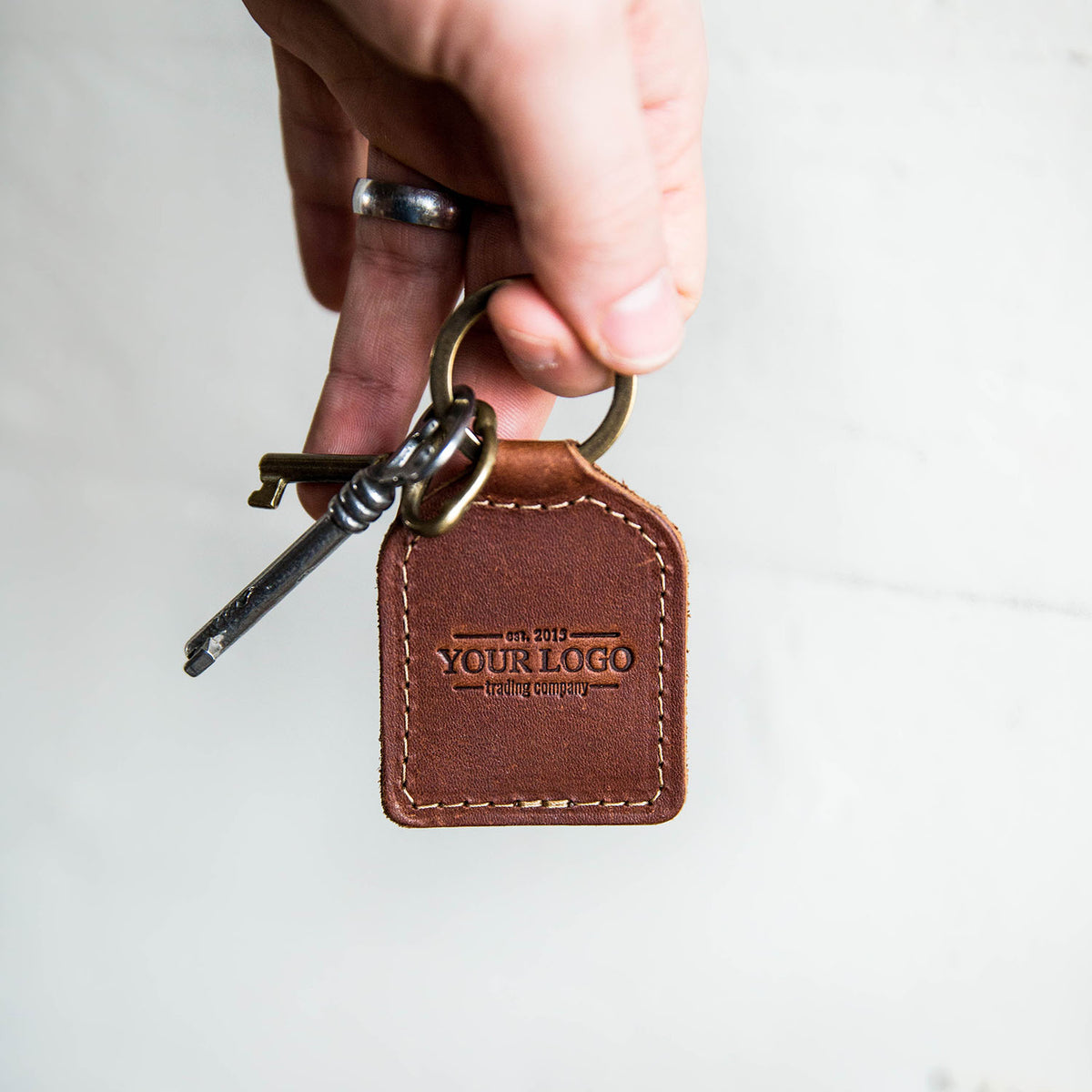 I made a leather keychain with a painting/sculpture technique